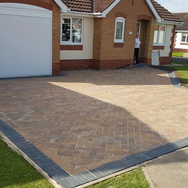 A brand new driveway outside a home